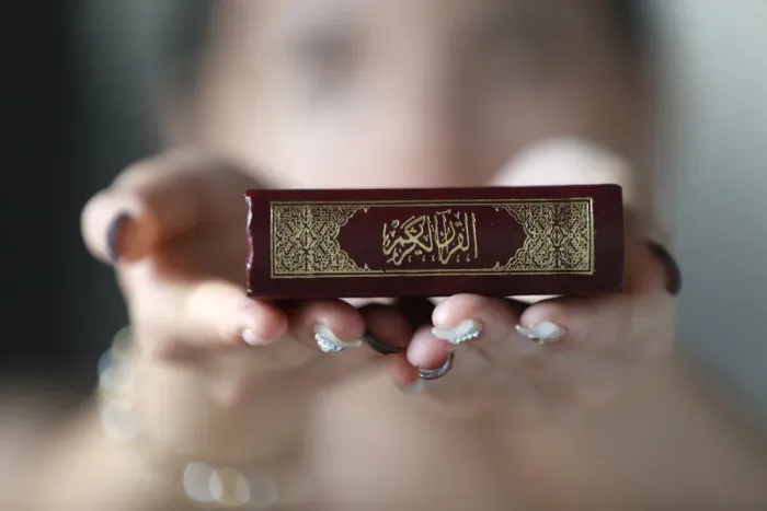 Framed Print : Muslim woman holding the Holy Quran book, Indochina, Southeast Asia, Asia Framed Print : Muslim woman holding the Holy Quran book, Indochina, Southeast Asia, Asia