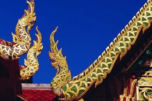 Nagas (sacred snakes) decoration on temple roof