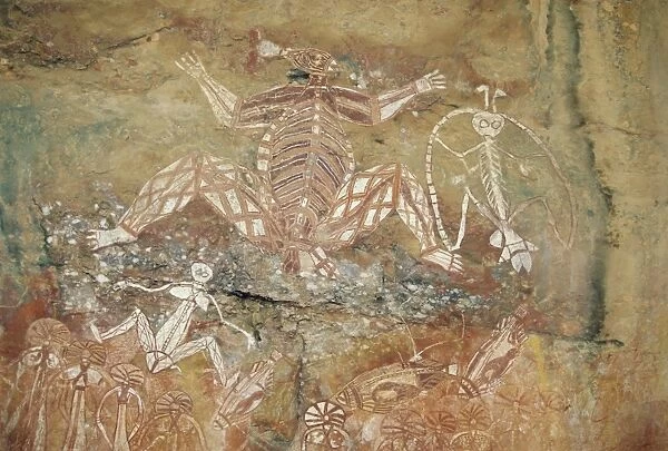 Namondjok (centre) who ate his clan sister, Namarrgon (right), the Lightning Man and Barrginj his wife (below left) supernatural ancestors at the rock art site at Nourlangie Rock, Kakadu National Park, Northern Territory