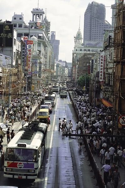 Nanjing Road, the main shopping street where cycles are banned to make space for buses