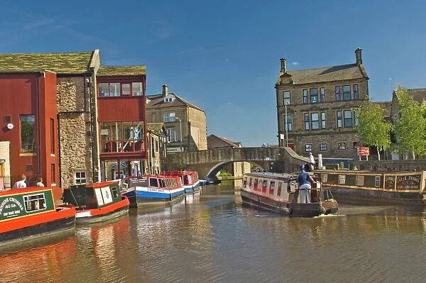 Narrow boats on the Liverpool Leeds canal, in the basin at Skipton, Yorkshire Dales National Park