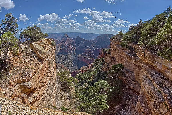 A narrow canyon along the south cliffs of Cape Final on the North Rim, with the pointed peak of Freya's Castle in the distance, Grand Canyon, Arizona, United States of America, North America