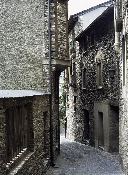 Narrow street in the old part of town, where many houses date from the 17th century