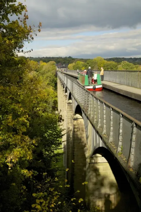 Framed Print : Narrowboat crossing the River Dee in autumn on the Pontcysyllte Aqueduct, built by Thomas Telford Framed Print : Narrowboat crossing the River Dee in autumn on the Pontcysyllte Aqueduct, built by Thomas Telford