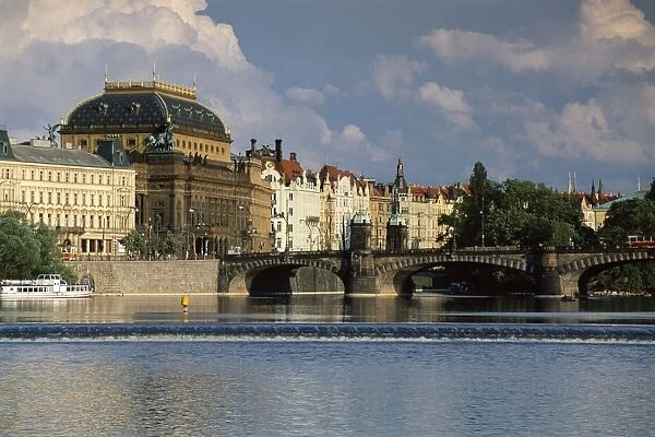 The National Theatre and house fronts along the Vltava River, Prague, Czech Republic