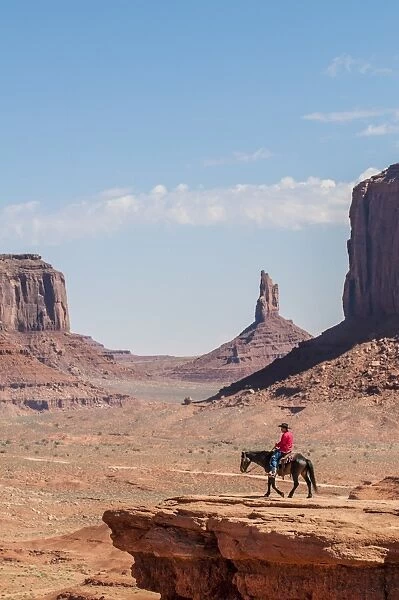 Navajo man on horseback, Monument Valley Navajo Tribal Park, Monument Valley, Utah