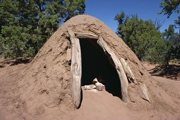 A Navajo steam bath where water is sprinkled on hot rock for steam