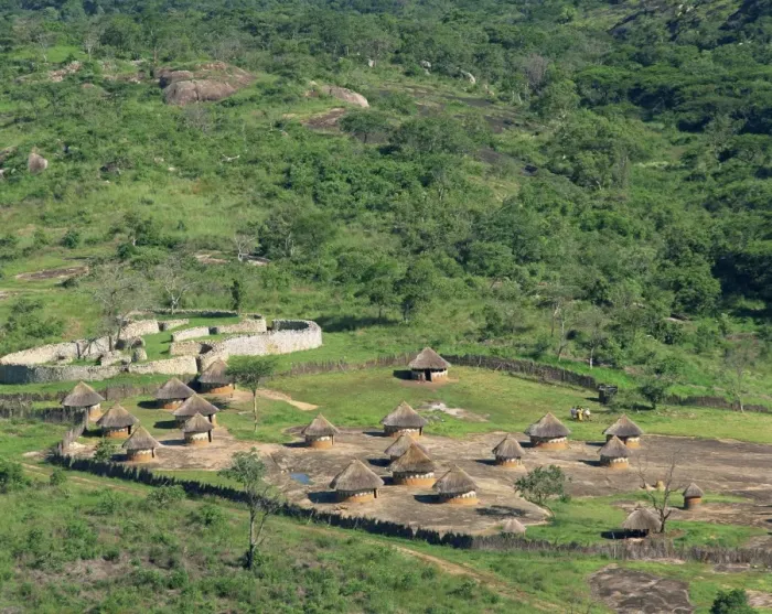 Framed Print : Nearby huts and Great Zimbabwe National Monument, UNESCO World Heritage Site Framed Print : Nearby huts and Great Zimbabwe National Monument, UNESCO World Heritage Site