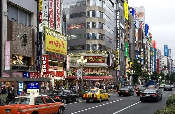 Neon signs light up the Kabukicho entertainment district in Shinjuku, Tokyo, Japan, Asia