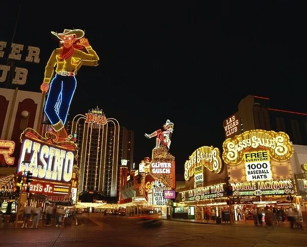 Neon signs at night on a street in Las Vegas, Nevada, United States of America