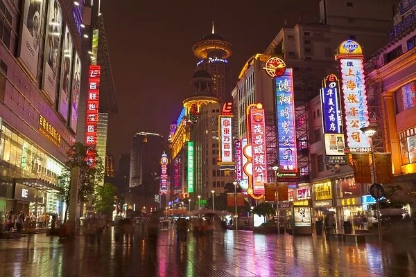 Neon signs and shoppers, Nanjing Road, Shanghai, China, Asia