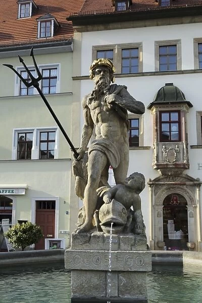 The Neptune Fountain on the cobbled Market Place (Marktplatz) in Weimar, Thuringia