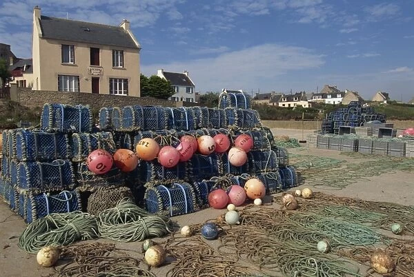 Nets stacked up at harbour side, village on coast, Molene Island, Bretagne (Brittany)
