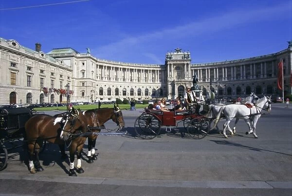 Neue Hofburg and fiaker (horse drawn carriages), Vienna, Austria, Europe