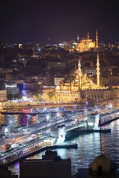 New Mosque (Yeni Cami) and Galata Bridge across Golden Horn at night seen from Galata Tower