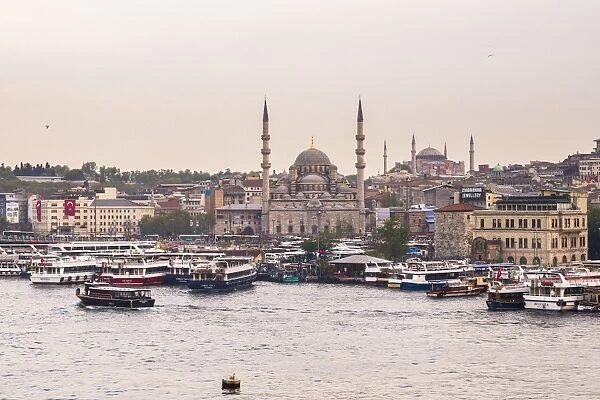 New Mosque (Yeni Cami) with Hagia Sophia (Aya Sofya) behind seen across the Golden Horn