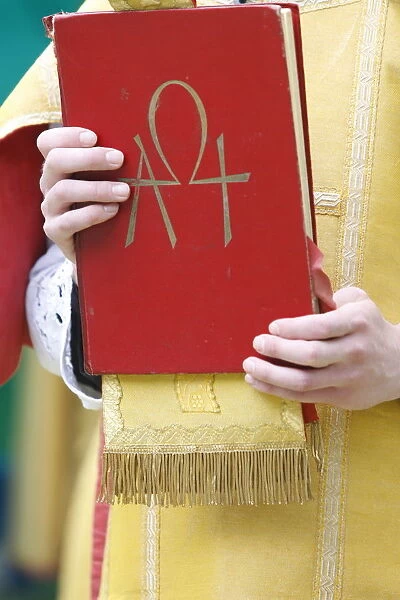 New Testament in Latin at a traditionalist Catholic pilgrimage, Villepreux, Yvelines