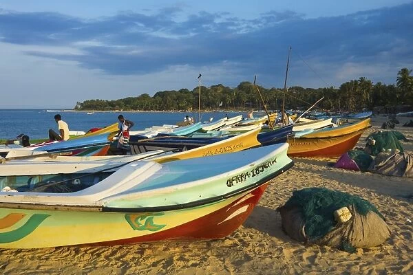 Newer post 2004 tsunami foreign-donated fishing boats on this popular surf beach, Arugam Bay, Eastern Province, Sri Lanka, Asia