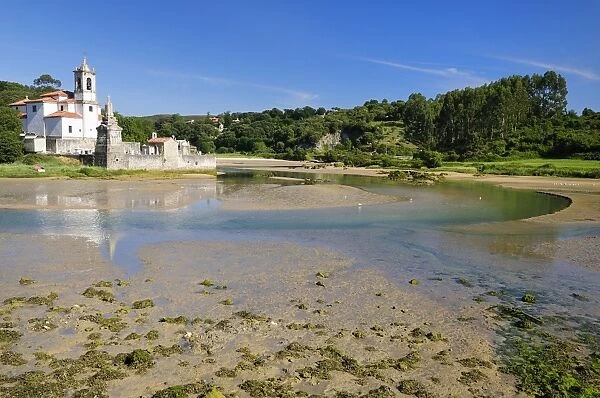 Niembro Bay with church and cemetery of Los Dolores at low tide, near Llanes, Asturias, Spain, Europe