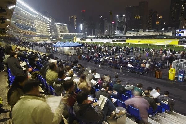 Night race at Happy Valley racecourse, Causeway Bay, Hong Kong, China, Asia