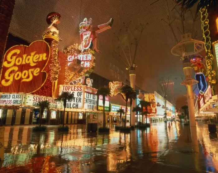 Framed Print : Night reflections on wet street of neon signs along Fremont Street in Las Vegas Framed Print : Night reflections on wet street of neon signs along Fremont Street in Las Vegas