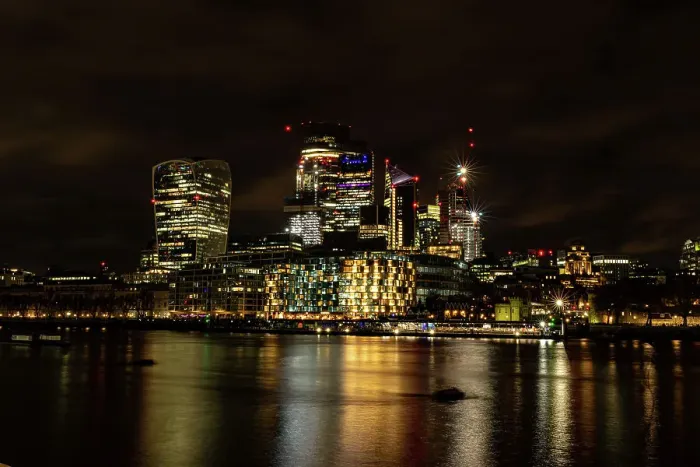 Framed Print : Night time cityscape with illuminated skyscrapers and reflections on water, City of London, England, United Kingdom, Europe Framed Print : Night time cityscape with illuminated skyscrapers and reflections on water, City of London, England, United Kingdom, Europe