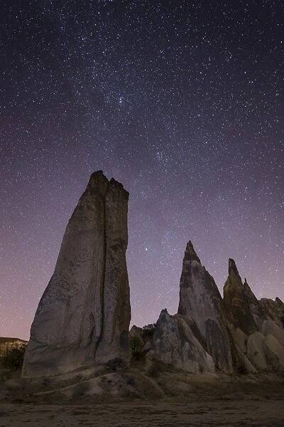 Night time in the Rose Valley showing the unusual rock formations and desert landscape light painted, Cappadocia, Anatolia, Turkey, Asia Minor, Eurasia