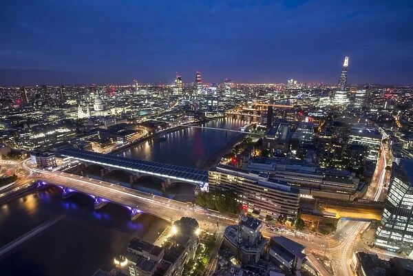 A night-time view of London and the River Thames from the top of Southbank Tower