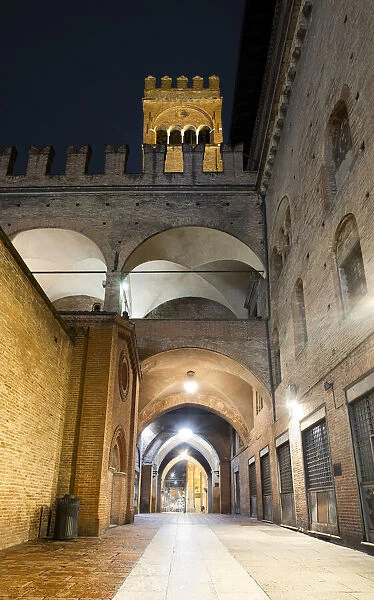 Night view of the Arengo tower in Piazza Maggiore, Bologna, Emilia Romagna, Italy, Europe