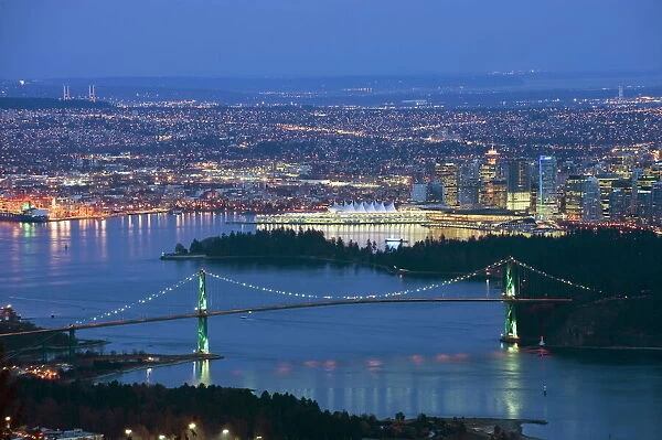 Night view of city skyline and Lions Gate Bridge, from Cypress Provincial Park