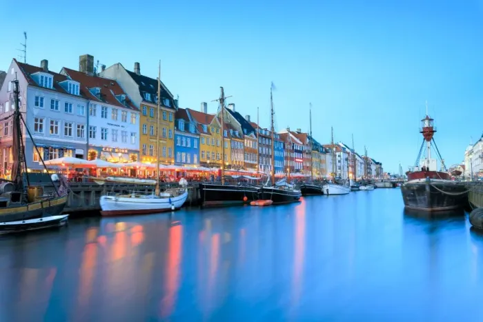 Framed Print : Night view of the illuminated harbour and canal of the entertainment district of Nyhavn Framed Print : Night view of the illuminated harbour and canal of the entertainment district of Nyhavn