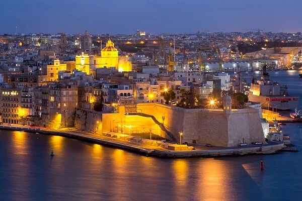Night view of Senglea, one of the Three Cities, and the Grand Harbour in Valletta