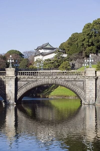 Niju Bashi bridge reflecting in moat, Imperial Palace, Tokyo, Japan, Asia