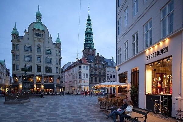 Nikolaj Church and restaurants at dusk, Copenhagen, Denmark, Scandinavia, Europe