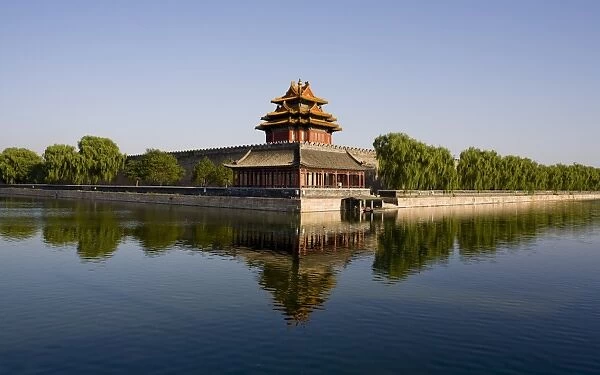 The northwest corner tower and water filled moat surrounding The Forbidden City