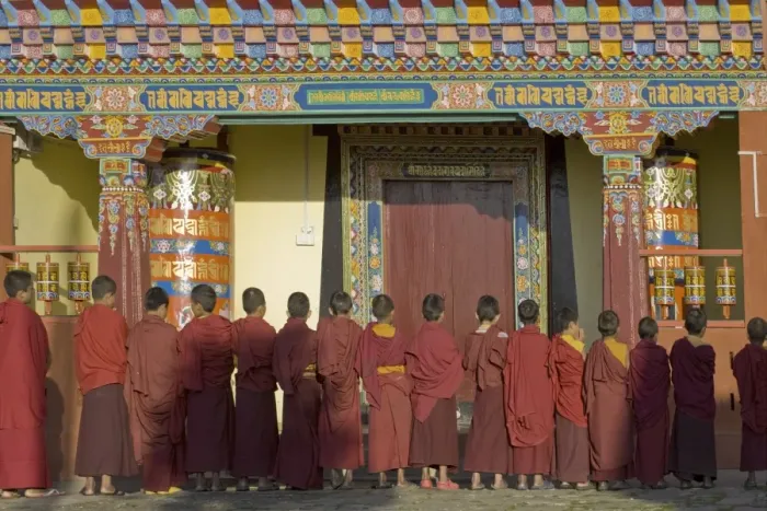 Framed Print : Novice monks line up in front of monastic building at the new Karma Theckhling Monastery Framed Print : Novice monks line up in front of monastic building at the new Karma Theckhling Monastery