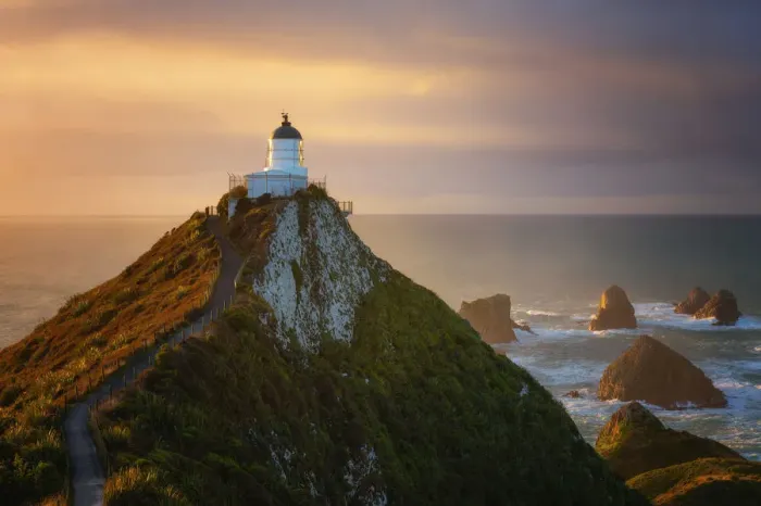 Framed Print : Nugget Point Lighthouse at sunrise, Nugget Point, Otago, South Island, New Zealand Framed Print : Nugget Point Lighthouse at sunrise, Nugget Point, Otago, South Island, New Zealand