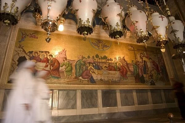 Nuns in front of wall painting of Jesus Christs death