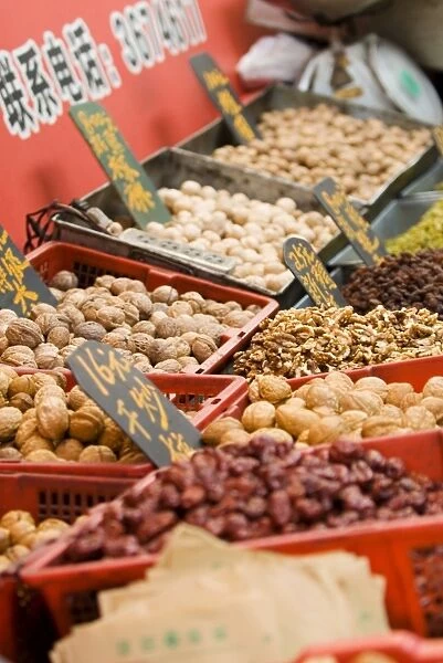 Nuts for sale at market, Xining, Qinghai, China, Asia