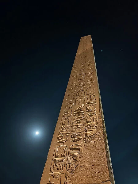 Obelisk at the Luxor Temple, at night under a full moon, constructed approximately 1400 BCE, UNESCO World Heritage Site, Luxor, Thebes, Egypt, North Africa, Africa
