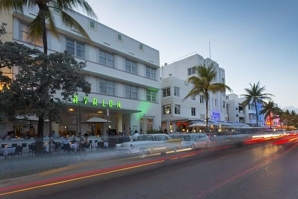 Ocean Drive restaurants and Art Deco architecture at dusk, South Beach, Miami Beach