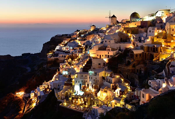 Oia at sunset, Santorini, Cyclades, Aegean Islands, Greek Islands, Greece, Europe