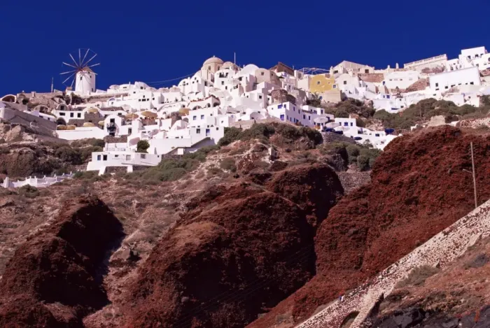 Framed Print : Oia village and red volcanic rocks Framed Print : Oia village and red volcanic rocks