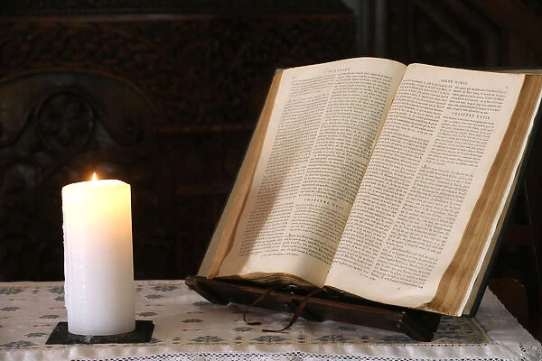 Old Bible and church candle, Carouge Protestant temple, Geneva, Switzerland, Europe