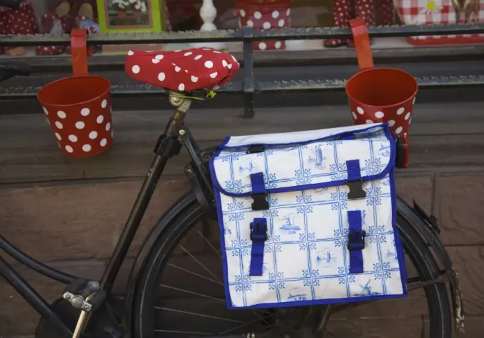 Framed Print : Old bicycle with a Delft design saddlebag. Amsterdam, Netherlands, Europe Framed Print : Old bicycle with a Delft design saddlebag. Amsterdam, Netherlands, Europe
