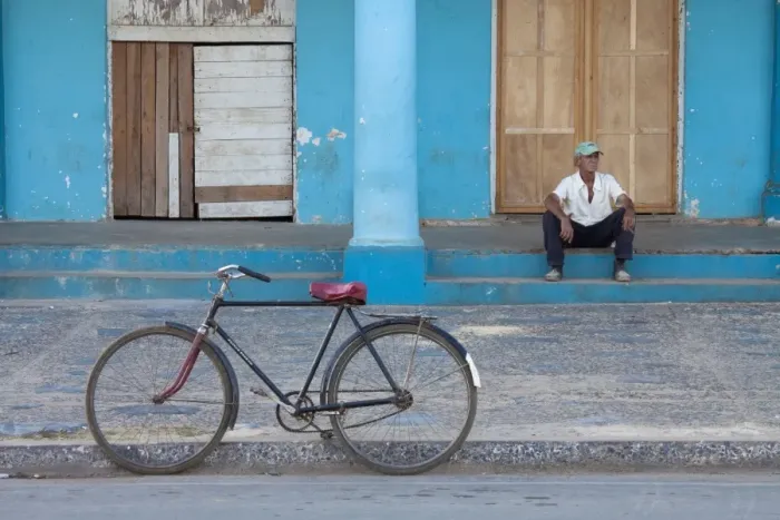 Framed Print : Old bicycle propped up outside old building with local man on steps, Vinales, Pinar Del Rio Province, Cuba, West Indies, Central America Framed Print : Old bicycle propped up outside old building with local man on steps, Vinales, Pinar Del Rio Province, Cuba, West Indies, Central America
