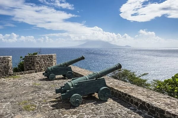 Old cannons on the southern coastline of St. Eustatius, Statia, Netherland Antilles