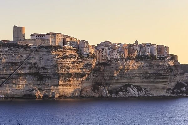 Old citadel at dawn, in early morning light, seen from the sea, Bonifacio, Corsica