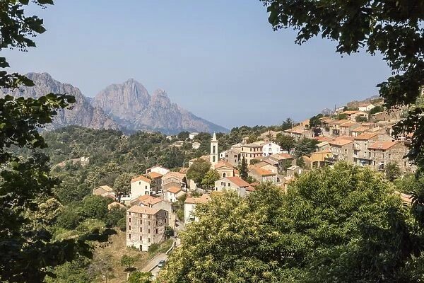 The old citadel of Evisa perched on the hill surrounded by mountains, Southern Corsica