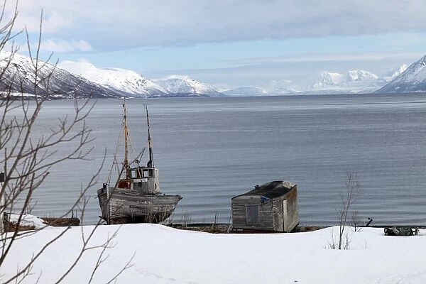Old fishing boat laid up on Kvaloya (Whale Island), Troms, arctic Norway, Scandinavia, Europe